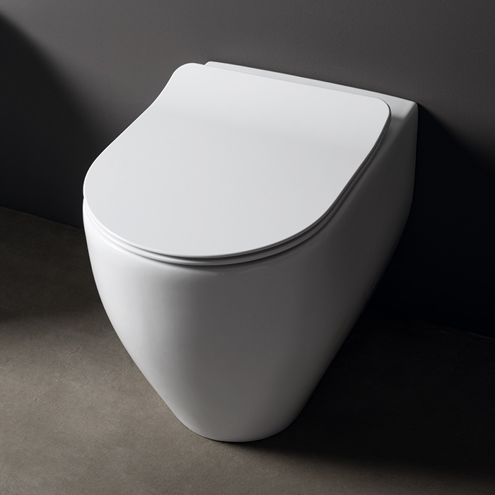 Унитазы Унитаз безободковый, приставной 55 см, слив универсальный, цвет белый 