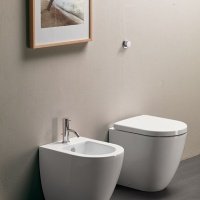 Унитазы Унитаз напольный приставной, безободковый (белый глянцевый) 